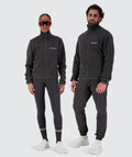 Gymnation Pile Jacket Unisex, Model Male 179cm size M / Female 167 size XXS #color_gravel-grey
